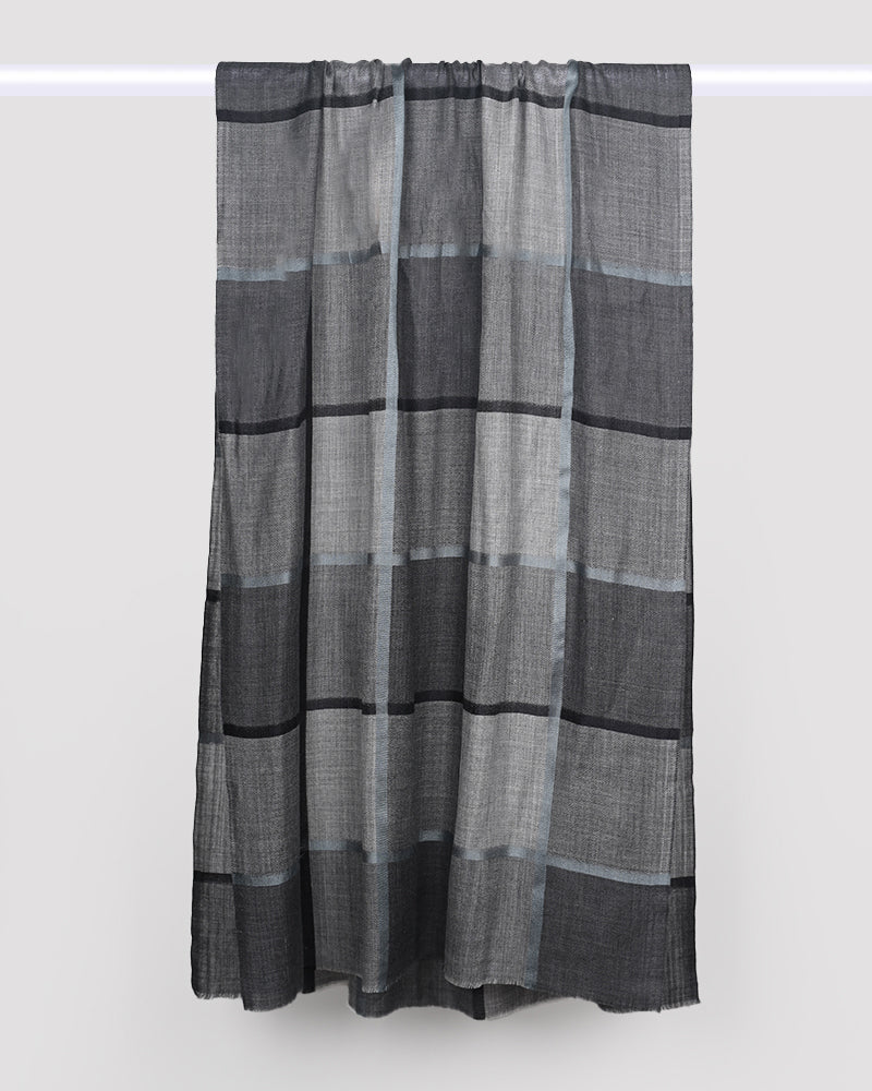 Sheer black and gray striped curtain