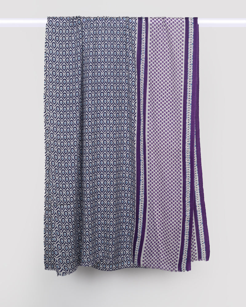 Textile with geometric pattern and purple stripes